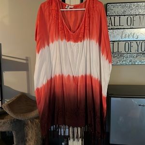 orange/white beach cover-up top with tassels around bottom